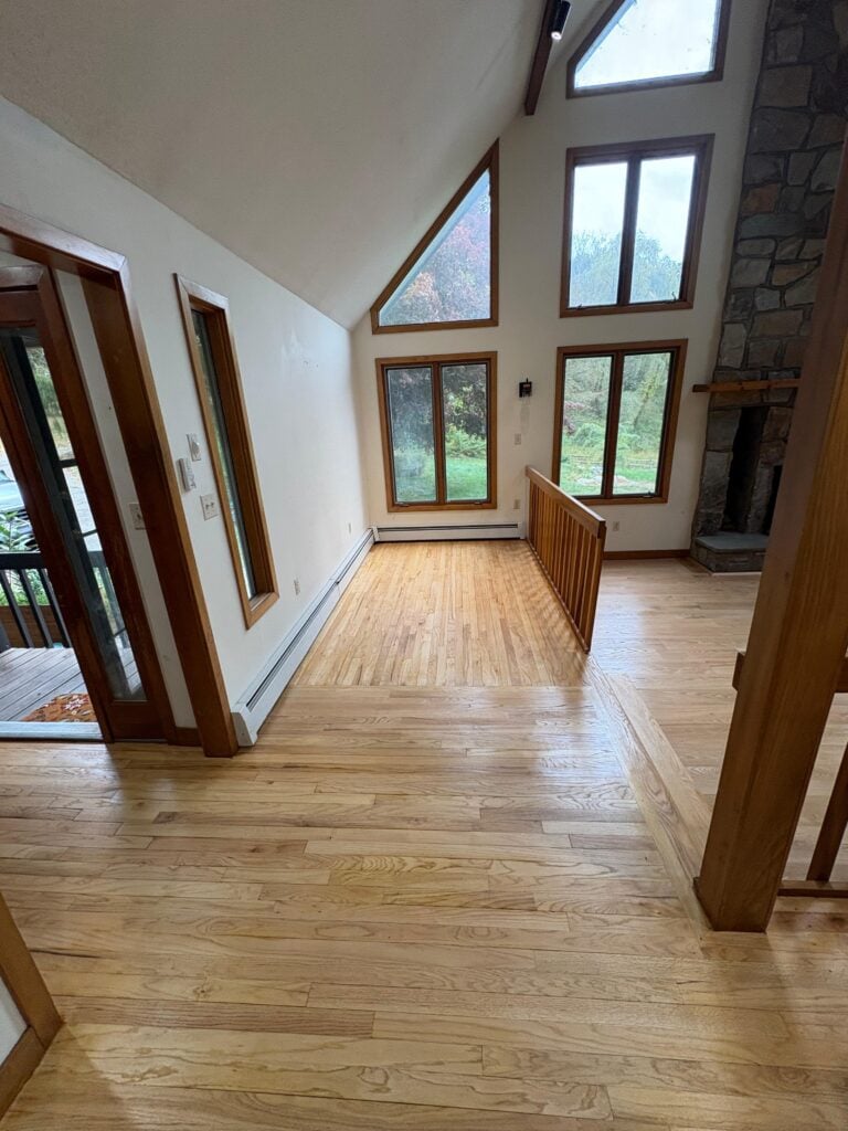 Dustless Hardwood Floors LLC Hardwood Flooring CT Spacious room with large windows.