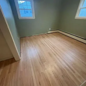 Empty room with hardwood floor
